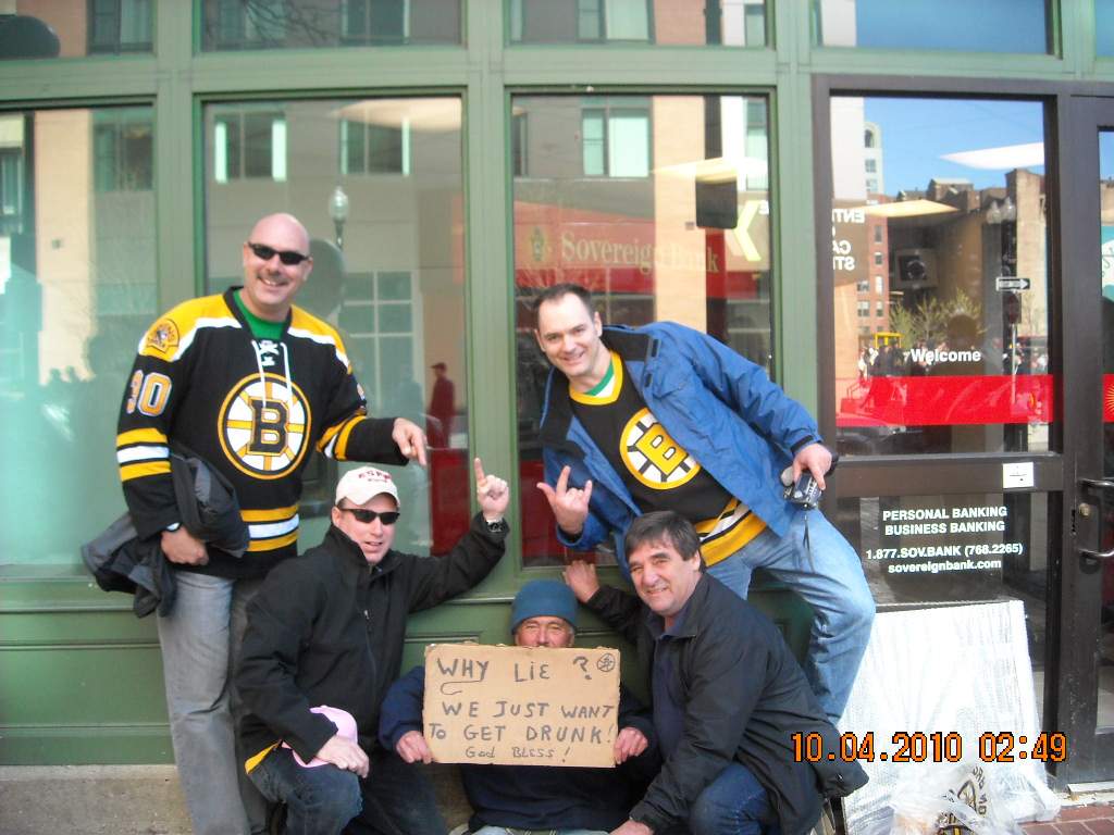 Met a couple of bums in front of Boston Garden looking for a handout, after killing ourselves laughing at their original sign we posed with one of them, and they ended up making about 50 bucks off of us.