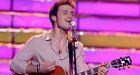 American Idol dark horse beats 'rock god'