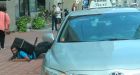 Toronto police seek public's help after video emerges showing taxi hitting cyclist